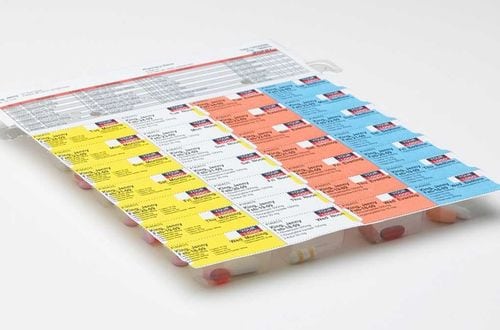 Dispill multi-dose medication packaging with color-coded compartments